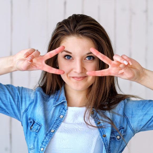 women peace sign