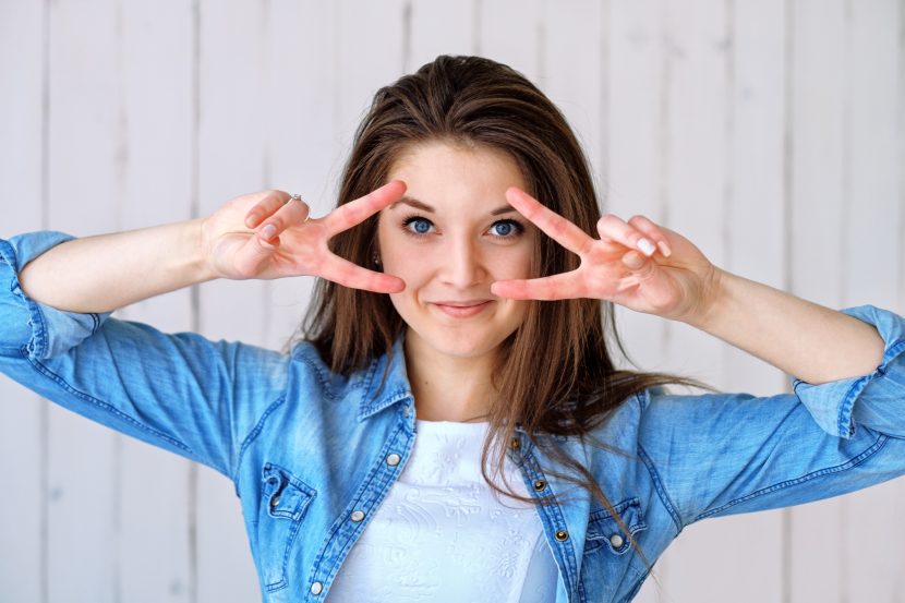 women peace sign