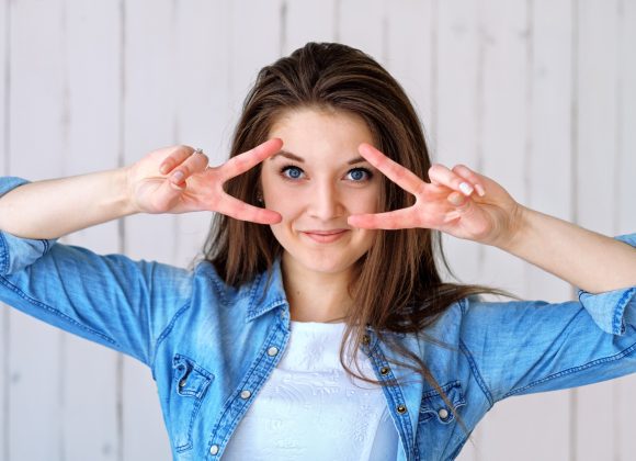 women peace sign